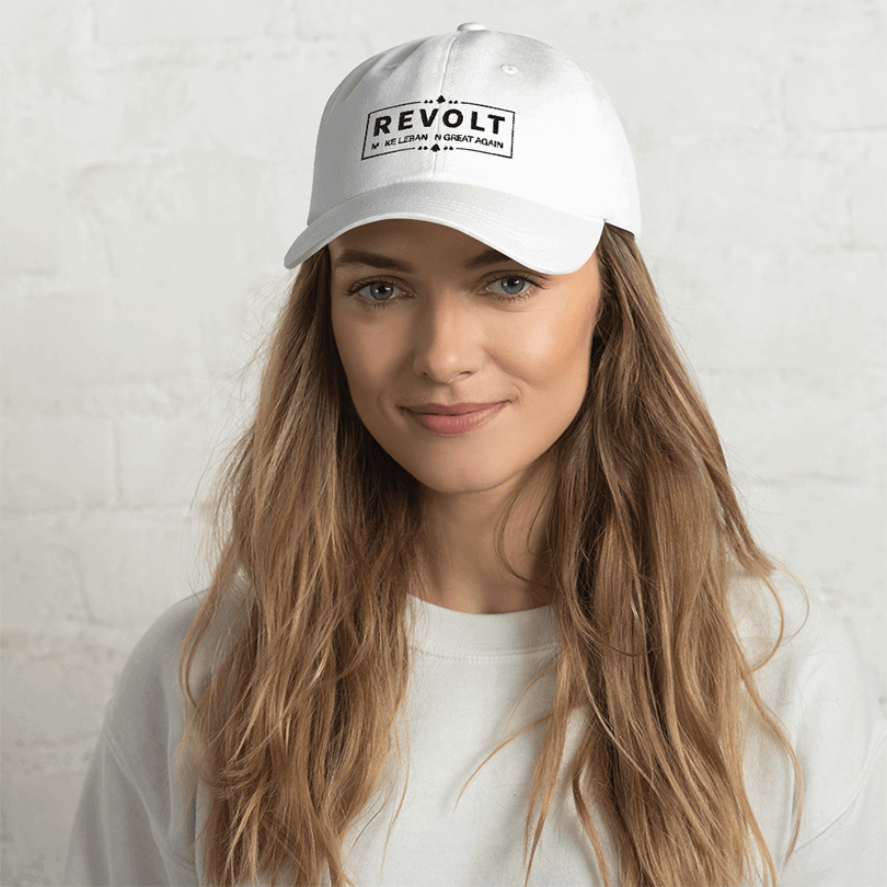 A white hat with 'Revolt - Make Lebanon Great Again' written on it, as requested by the client